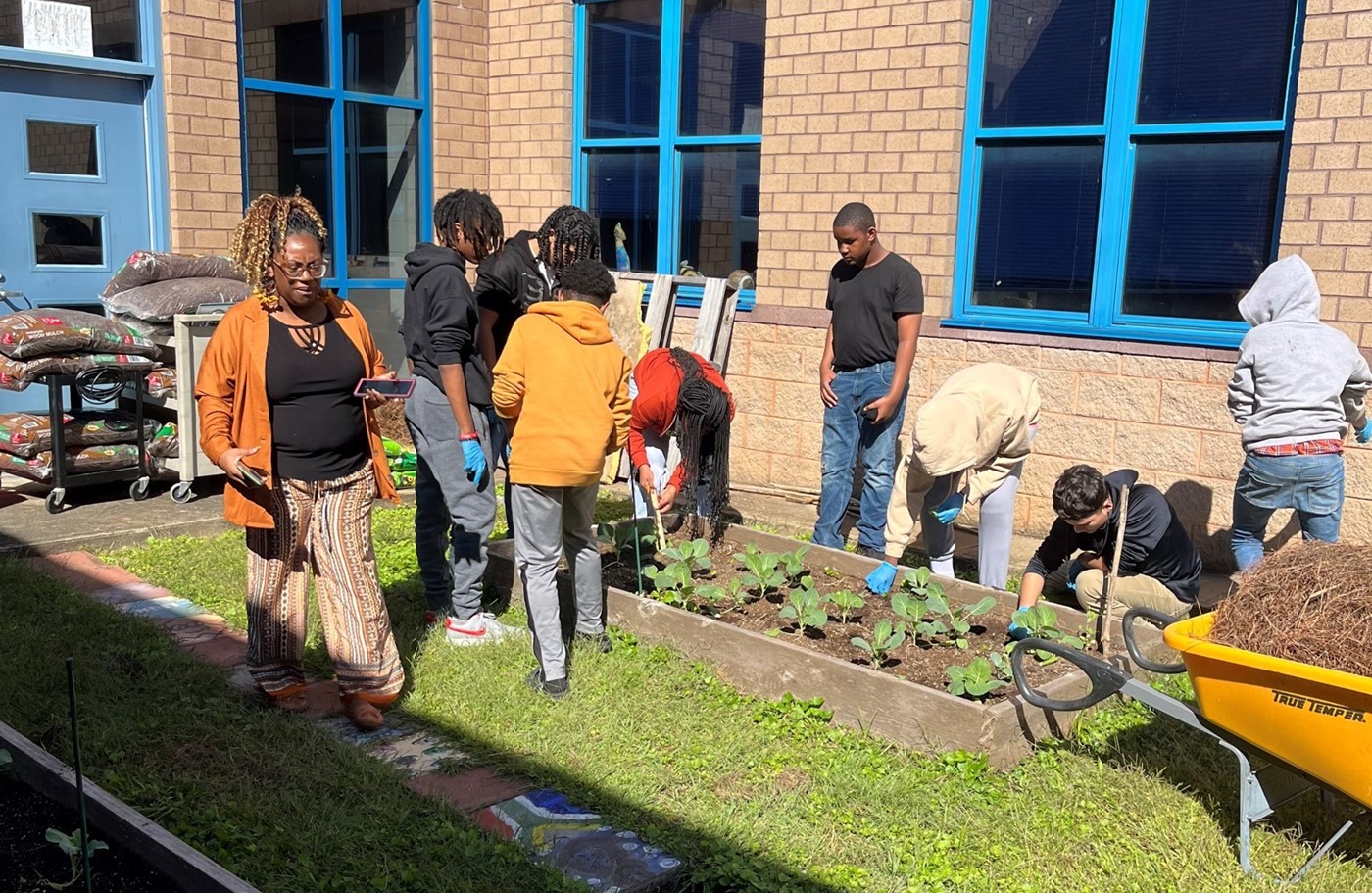 students working in the garden